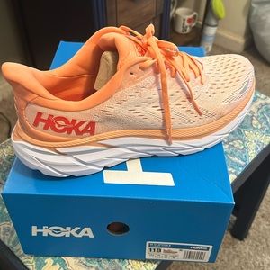 Never worn Hoka shoes. Includes box